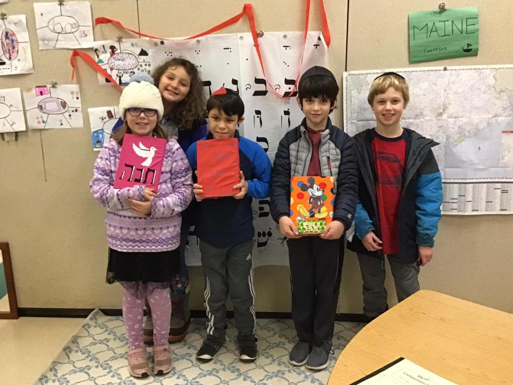 A picture of five elementary aged students