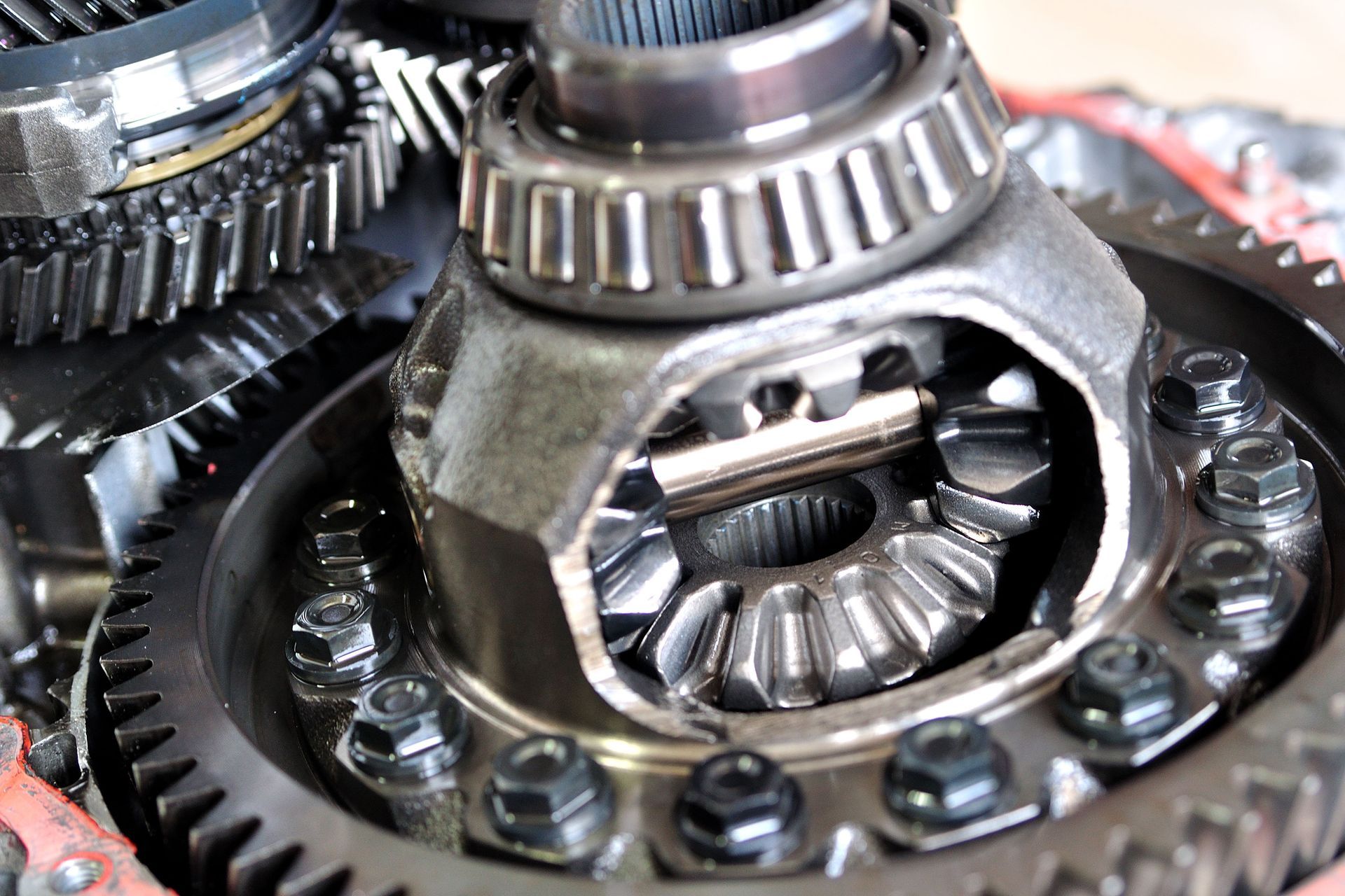 A close up of a gearbox with bearings and gears