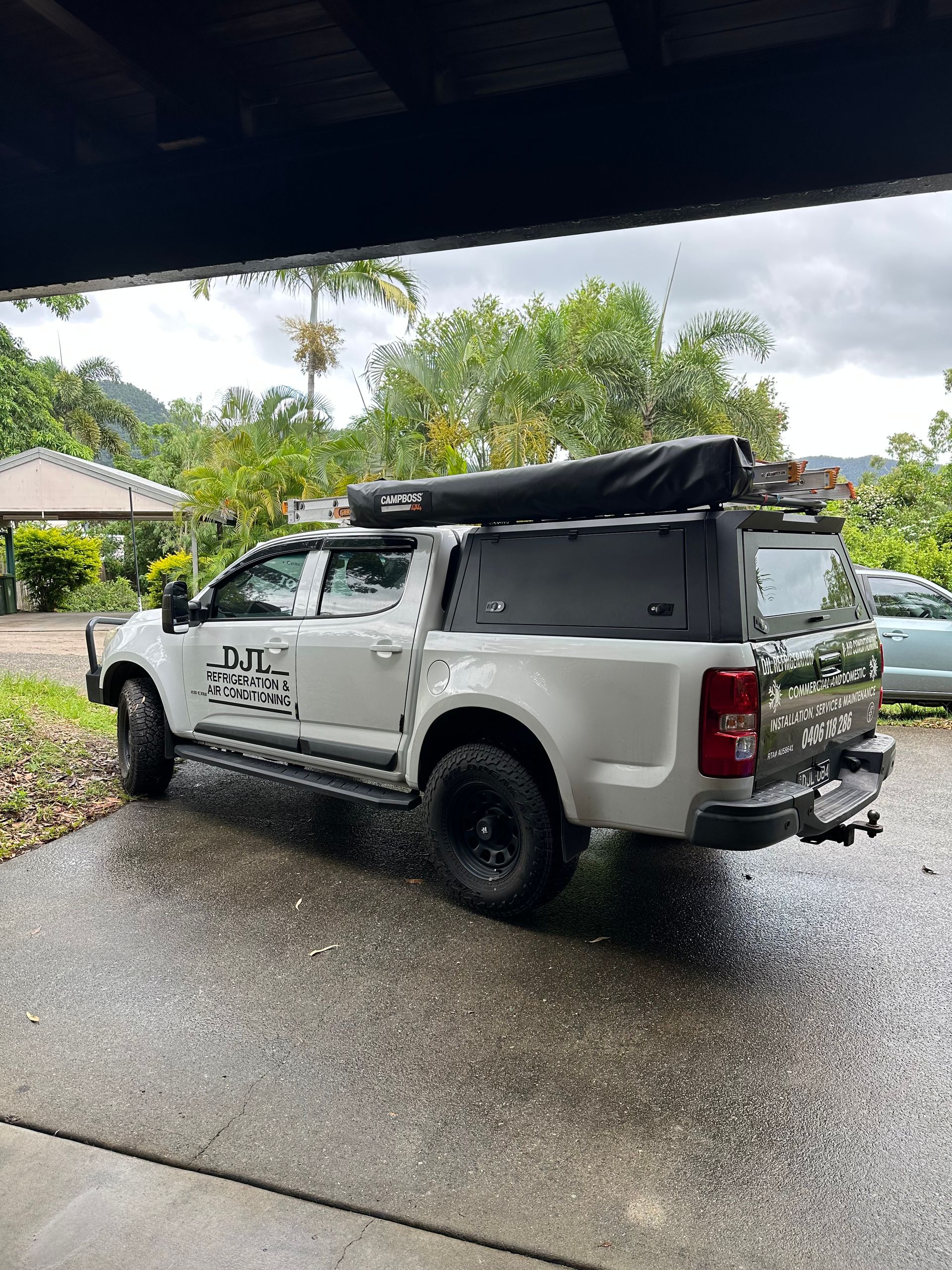 White Pickup Truck With Black Canopy — DJL Refrigeration & Air Conditioning In Cannonvale, QLD
