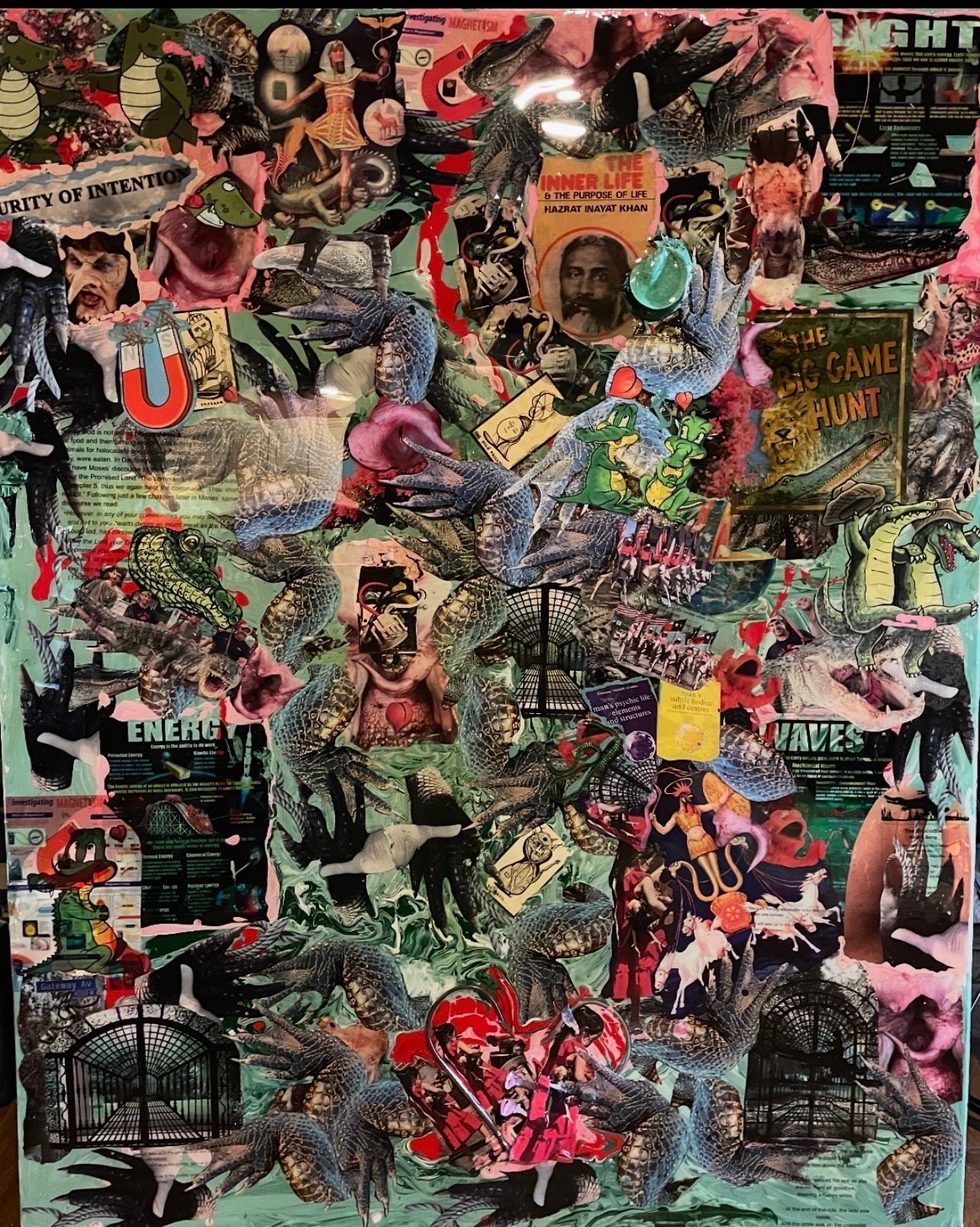 A collage of various images and objects on a wall.