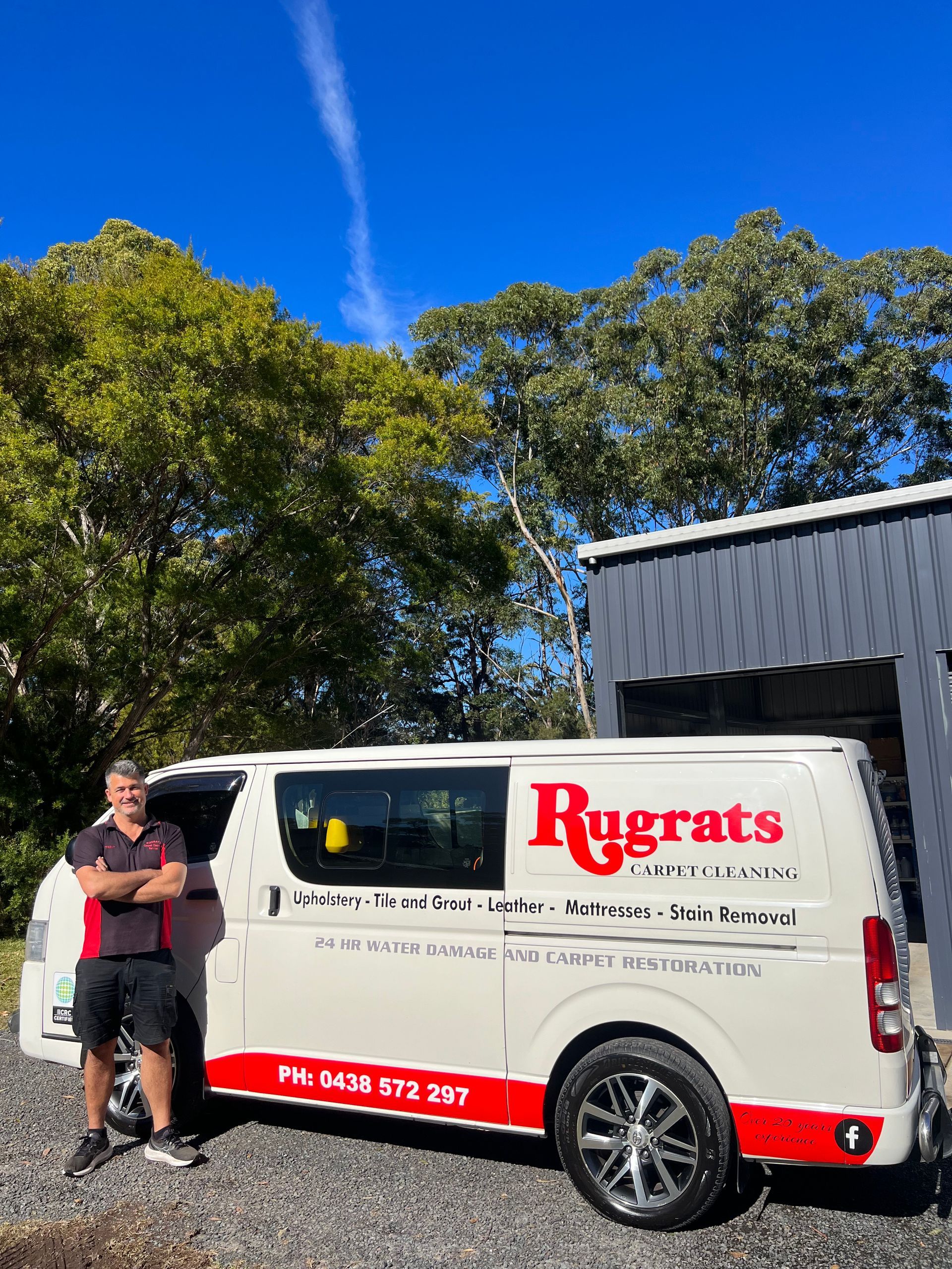A Person Wearing Orange Gloves is Cleaning a Tile Floor With a Brush — Rugrats Carpet Cleaning Service In Diamond Beach, NSW