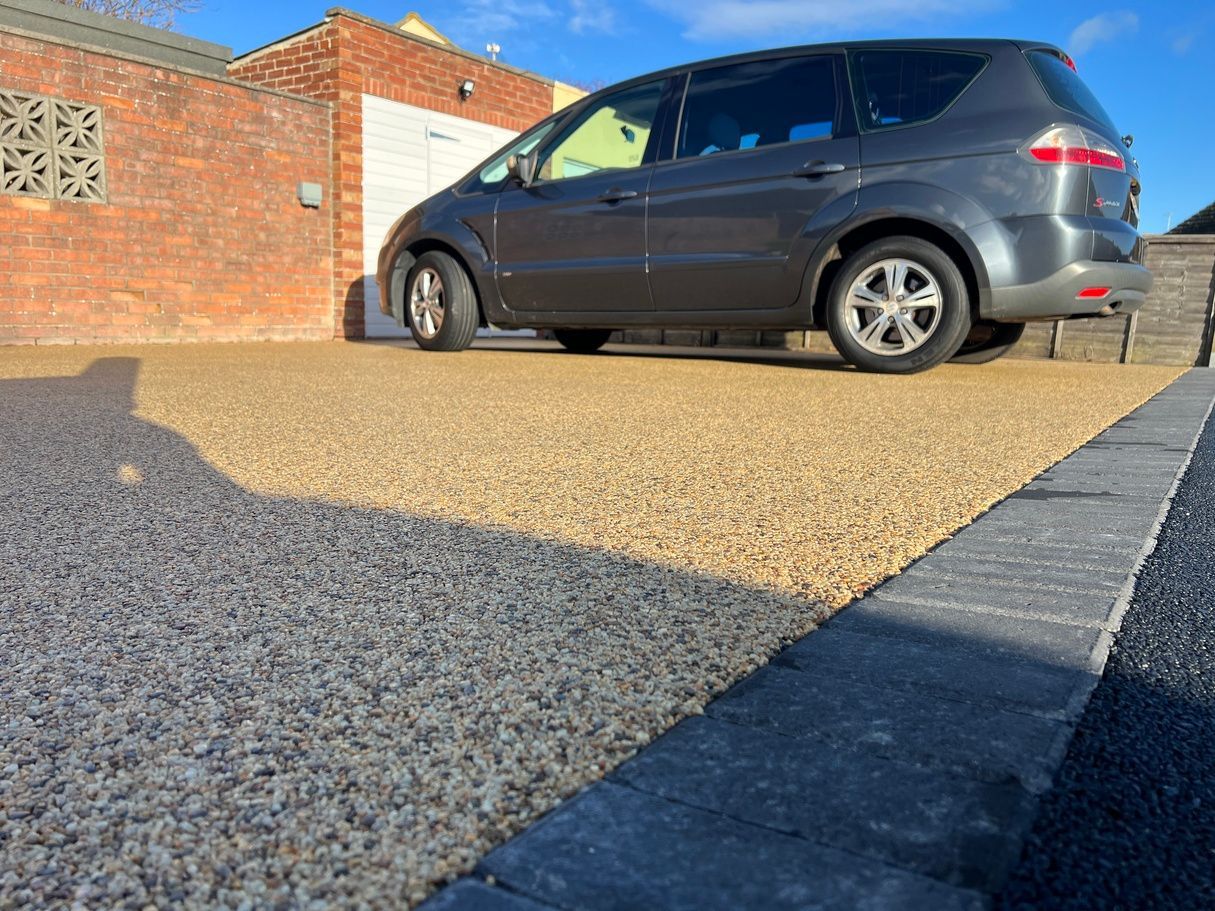 Resin bound driveway spread.