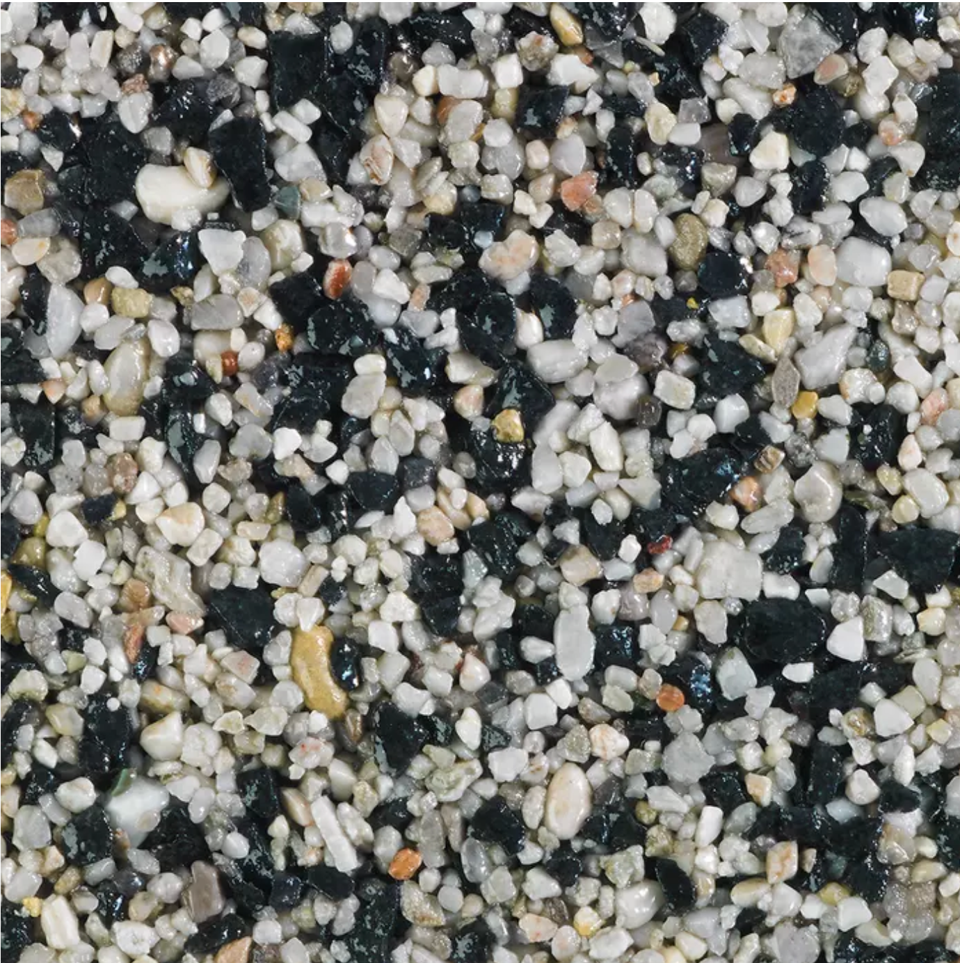 Textured surface of small, mixed-color pebbles in white, black, and beige.