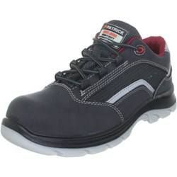 Un paio di scarpe antinfortunistiche Patrick bianche e nere su sfondo bianco.