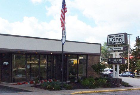 A brick building with a sign that says ' bockley loan company ' on it