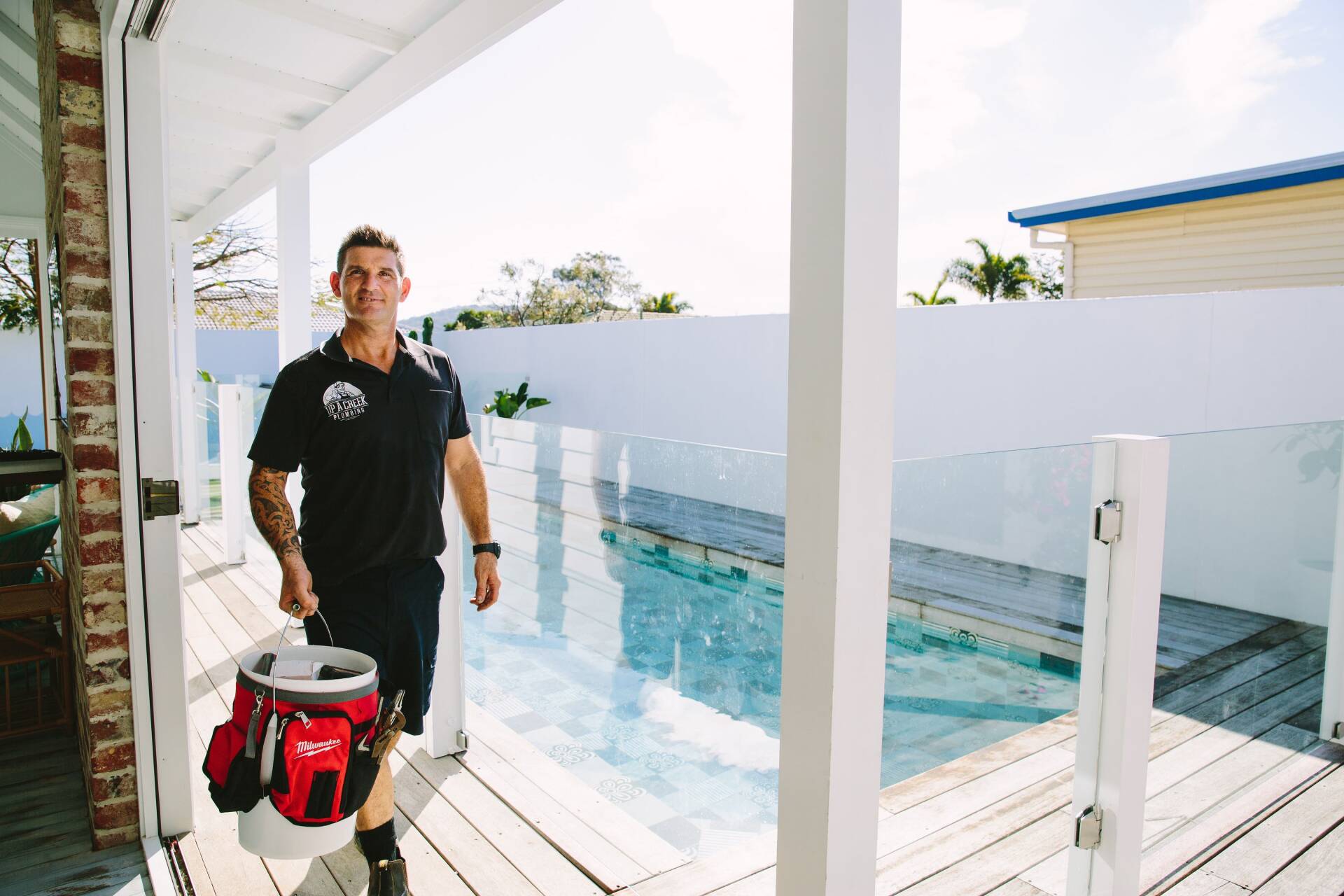 Man holding a plumbing tool — Emergency plumber in Tugun, QLD
