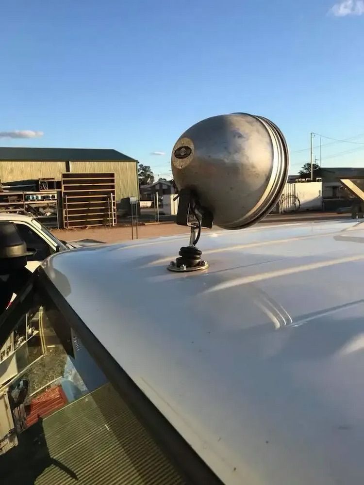 A Light Is Mounted On The Roof Of A Car — Ag Auto Spark in Narromine, NSW