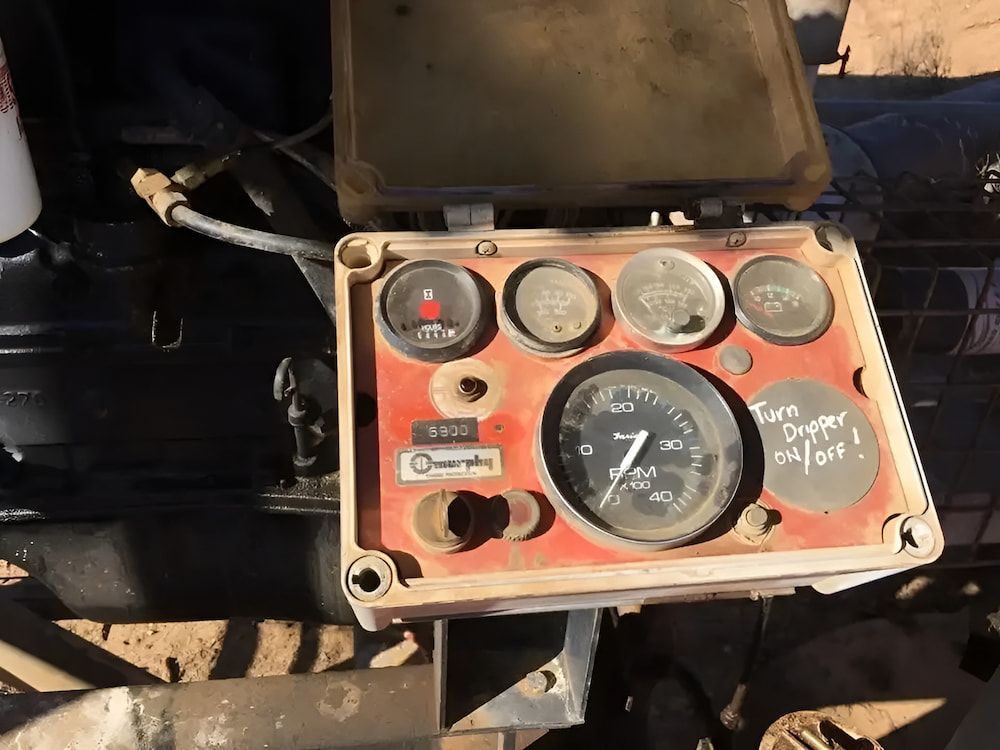 A Dashboard On A Vehicle With The Number 7 On It — Ag Auto Spark in Narromine, NSW