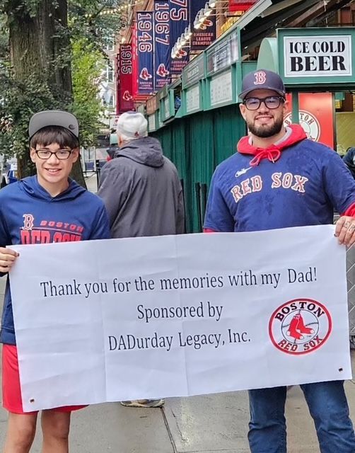 A Thank You Poster Holded By Boys