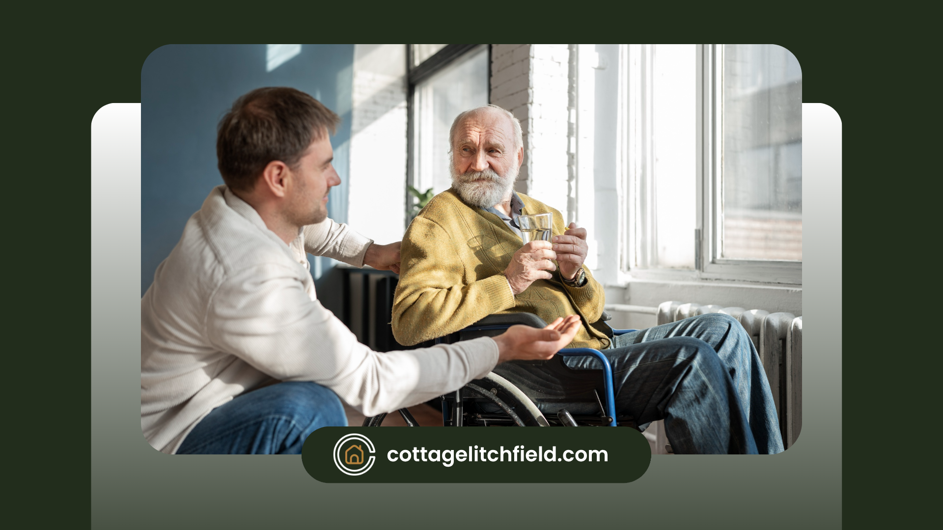 A man is talking to an older man in a wheelchair.