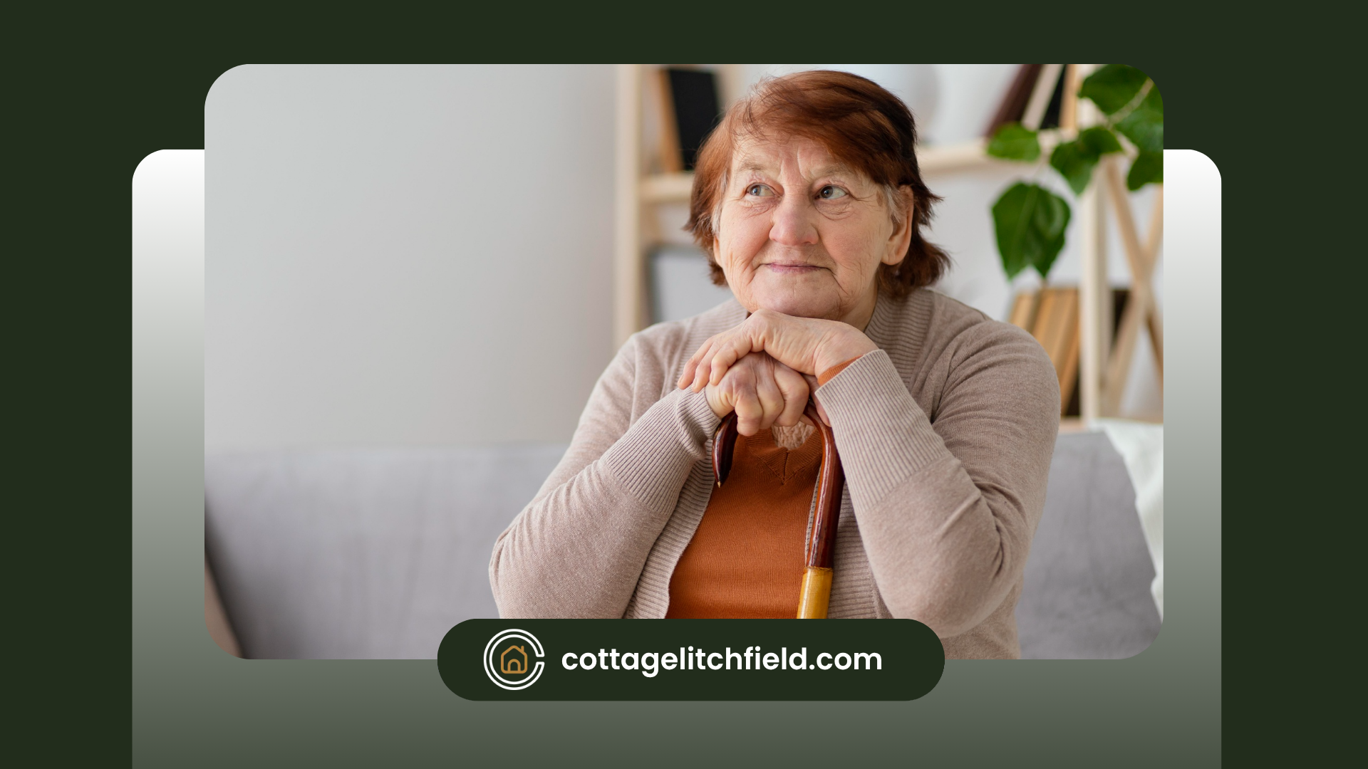 An elderly woman is sitting on a couch with a cane.