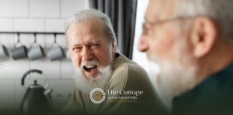 An elderly man yelling at another elderly man