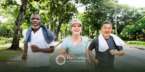 A group of senior living residents is jogging outdoors