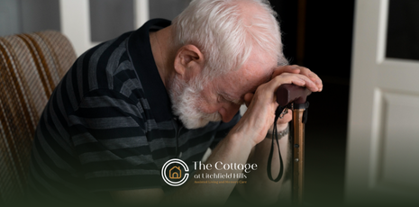 A patient with dementia lying his head down his crane