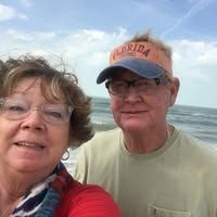 Silhouette of a person in a blue circle; neutral avatar.