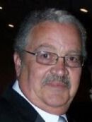 Silhouette of a person in a blue circle; neutral avatar.