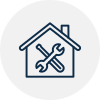 A house icon with a crossed wrench and screwdriver, symbolizing home repair services.