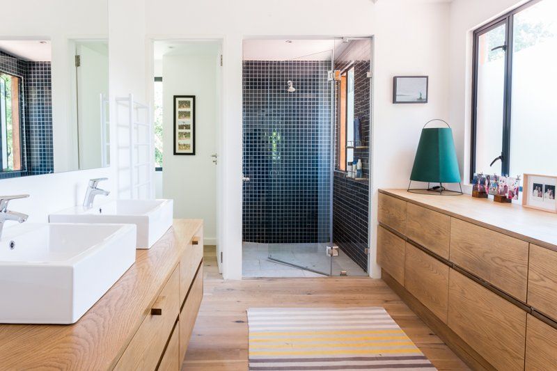 A bathroom with two sinks and a walk in shower. 7 Lemon Lane – Newlands