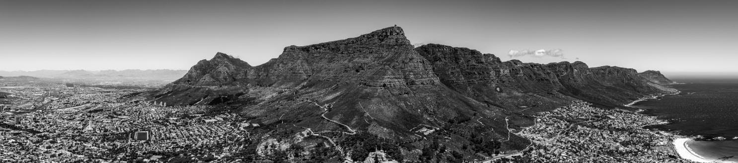 mountains with the city of cape town surrounding them