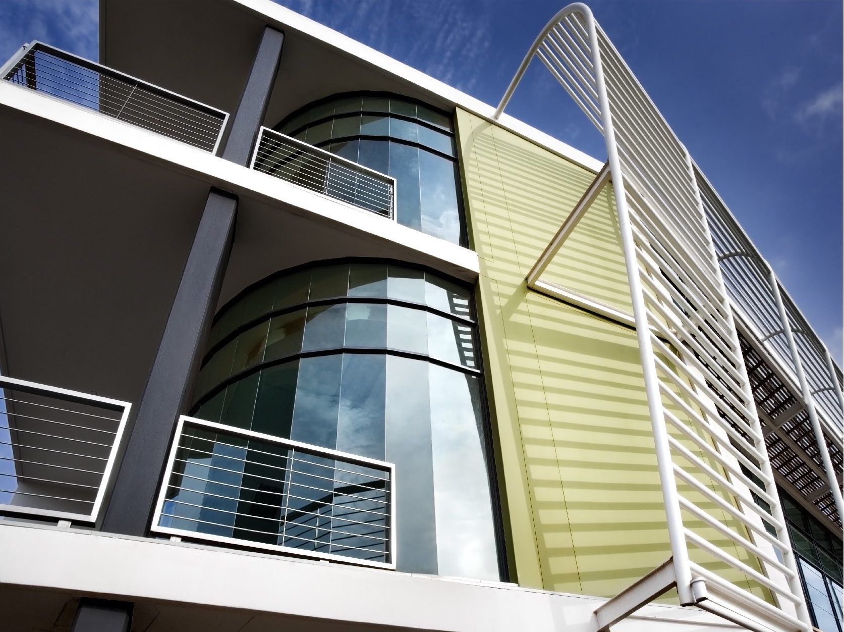 A building with a lot of windows and balconies