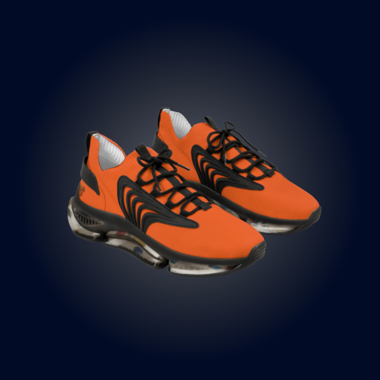 Orange and black athletic shoes with black laces and a clear sole.
