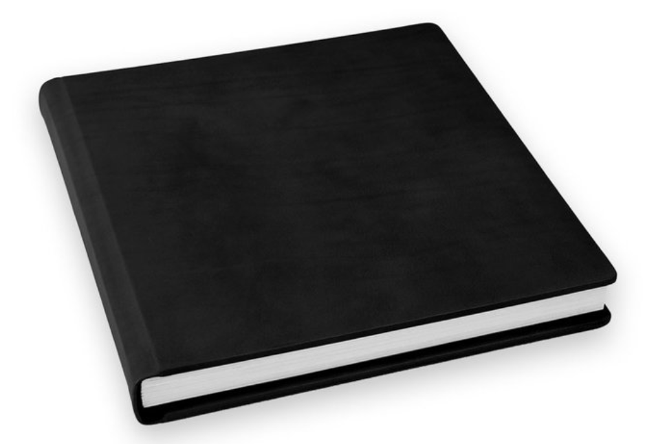 A black book with white pages on a white background