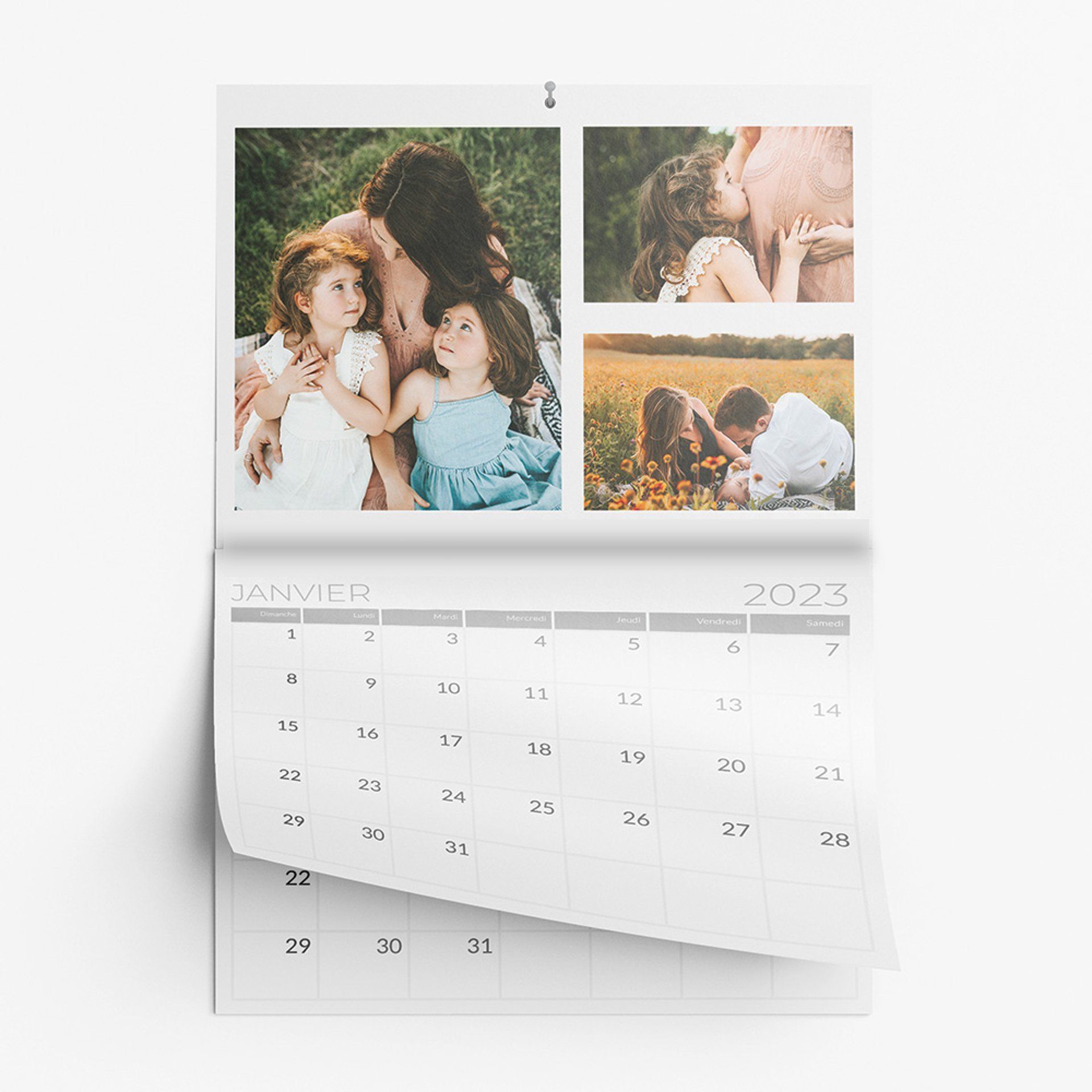 A calendar with four pictures of a family on it.