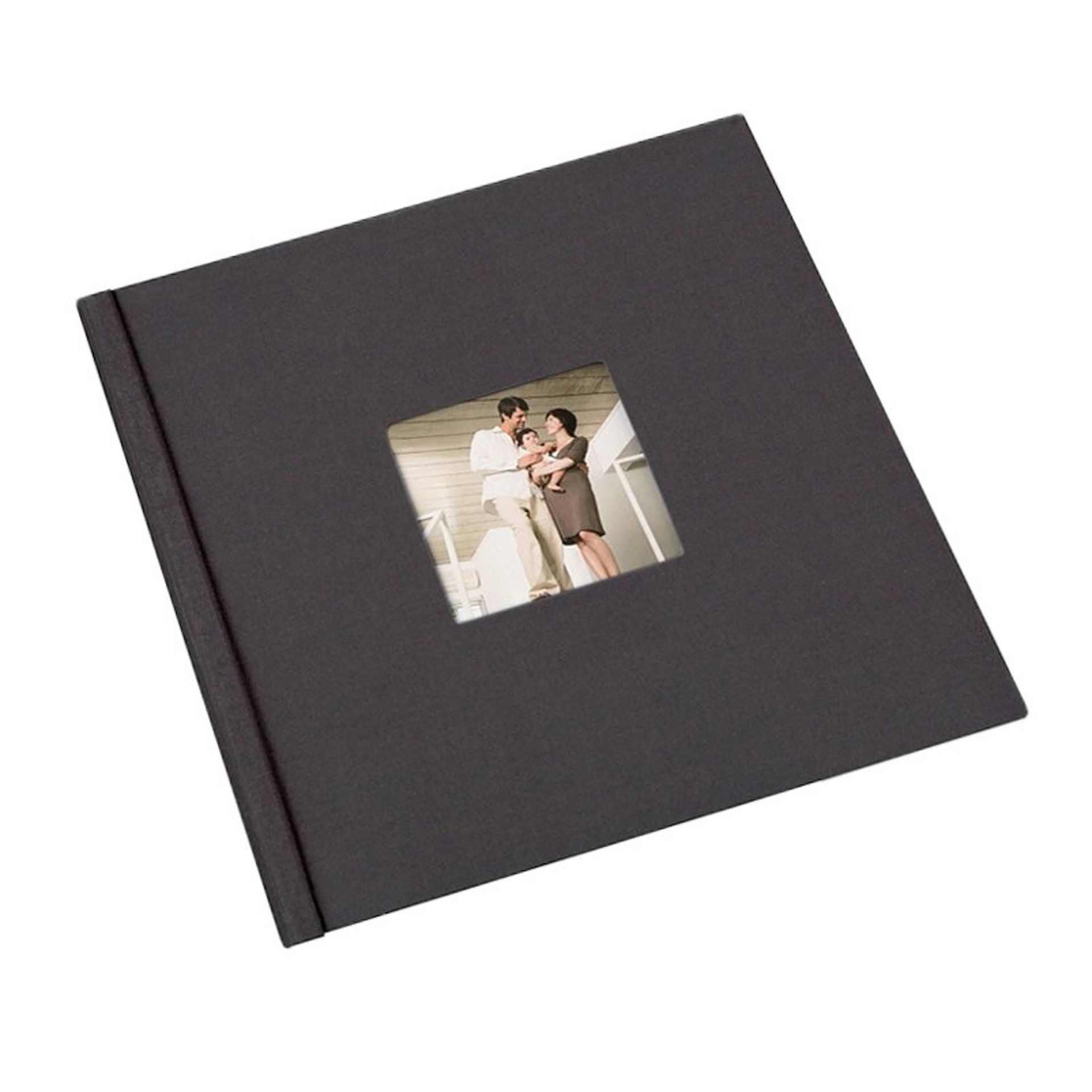 A black photo album with a picture of a man and woman