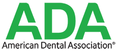 The logo for the american dental association is green and white.