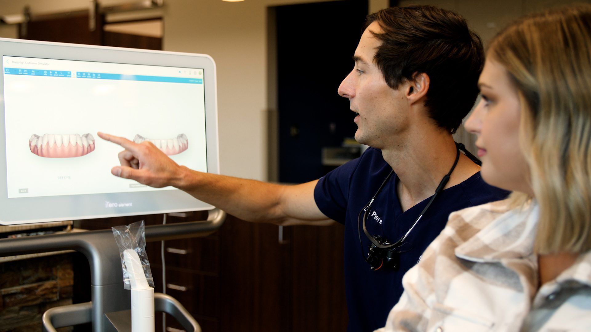 Dr. Piers showing patient xray on computer | Best orthodontist in Hickory NC