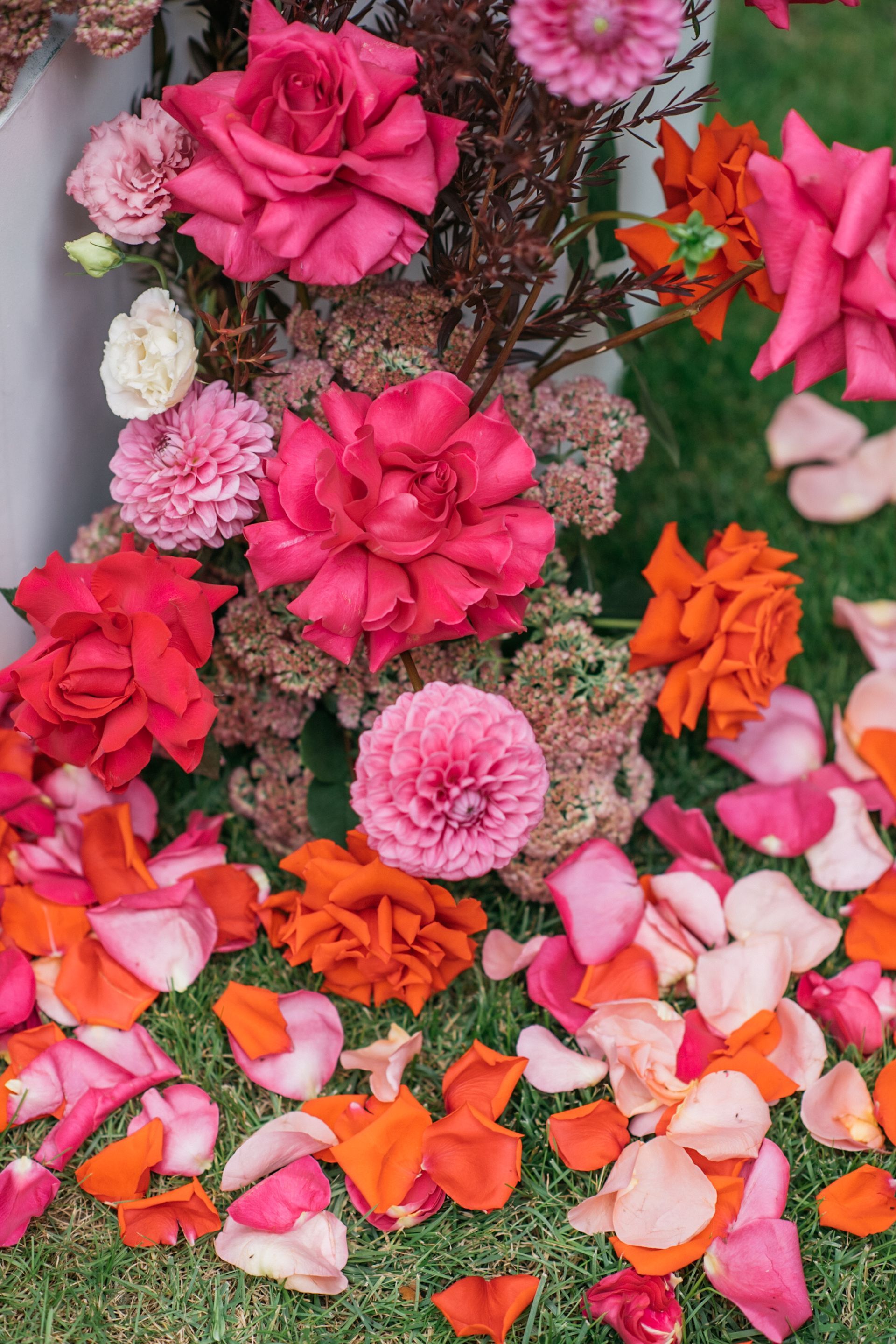 Table with a vase of flowers and candles on it — Flowers in Shellharbour, NSW