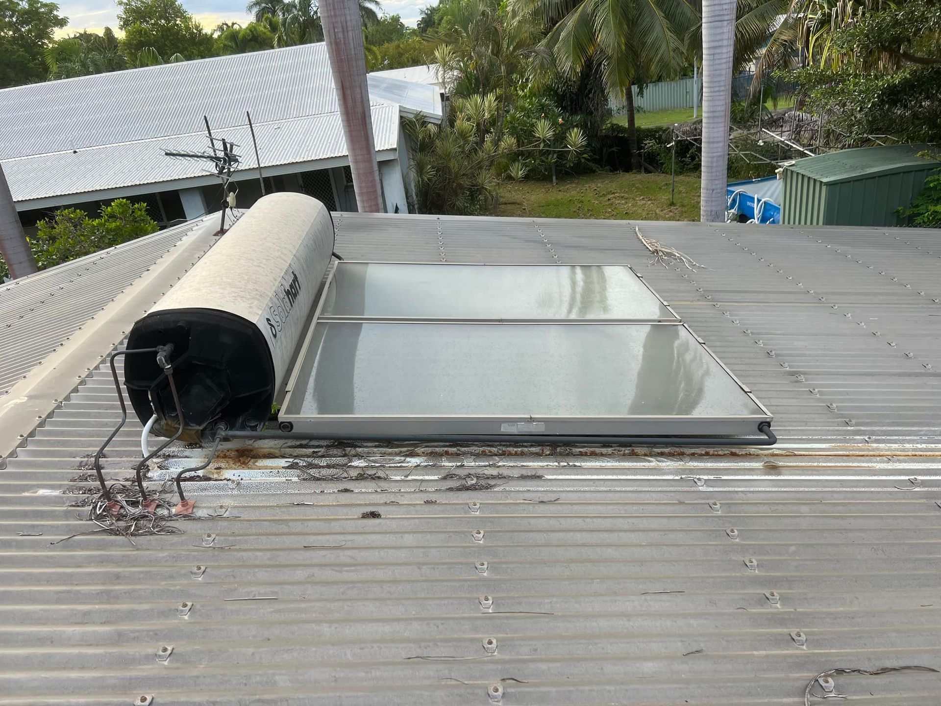 Solar Water Heater on a Corrugated Metal Roof — Northern Plumbing Maintenance & Repairs in Leanyer, NT