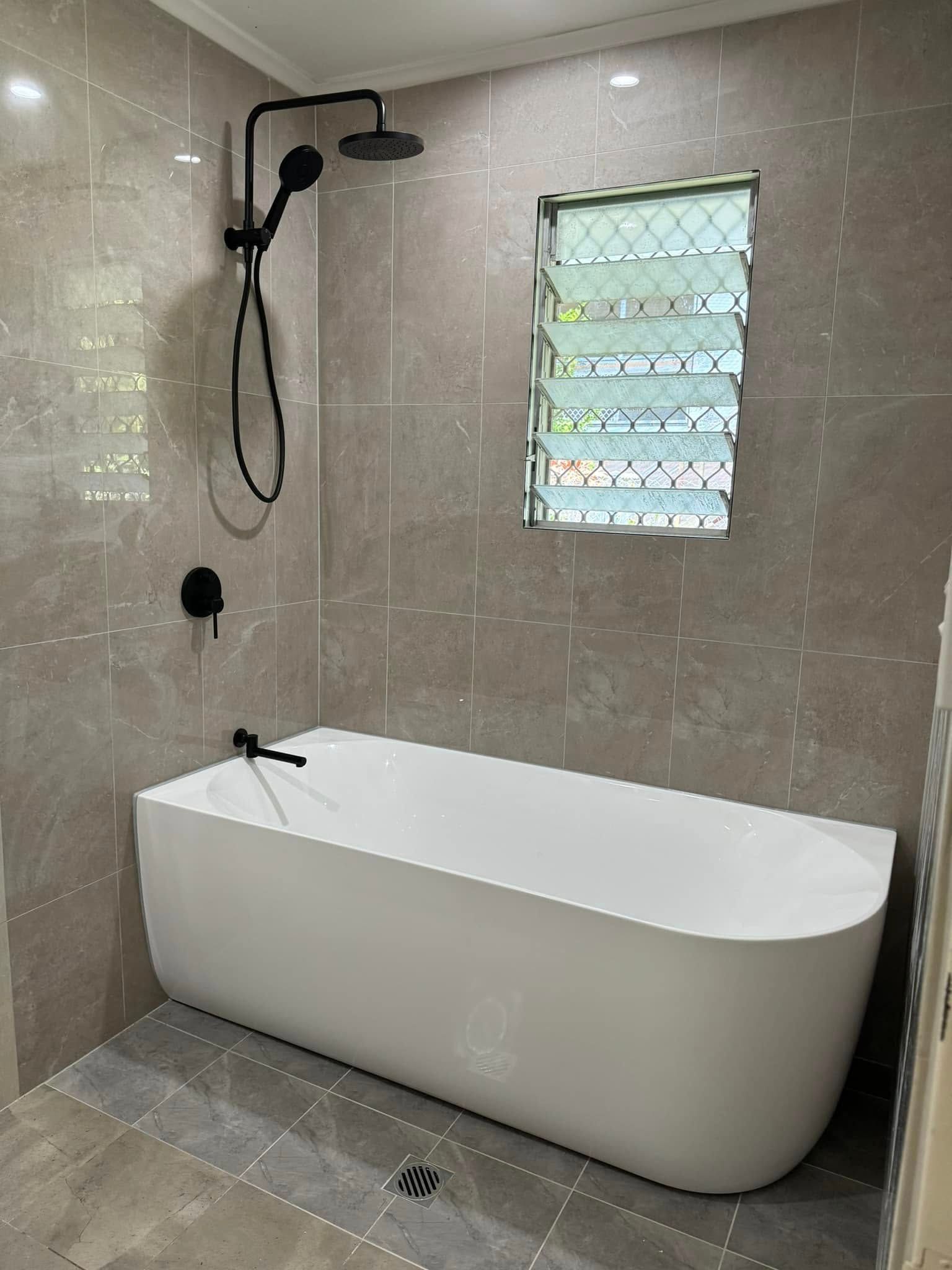 Accessible Bathroom With Shower and Toilet — Northern Plumbing Maintenance & Repairs in Leanyer, NT