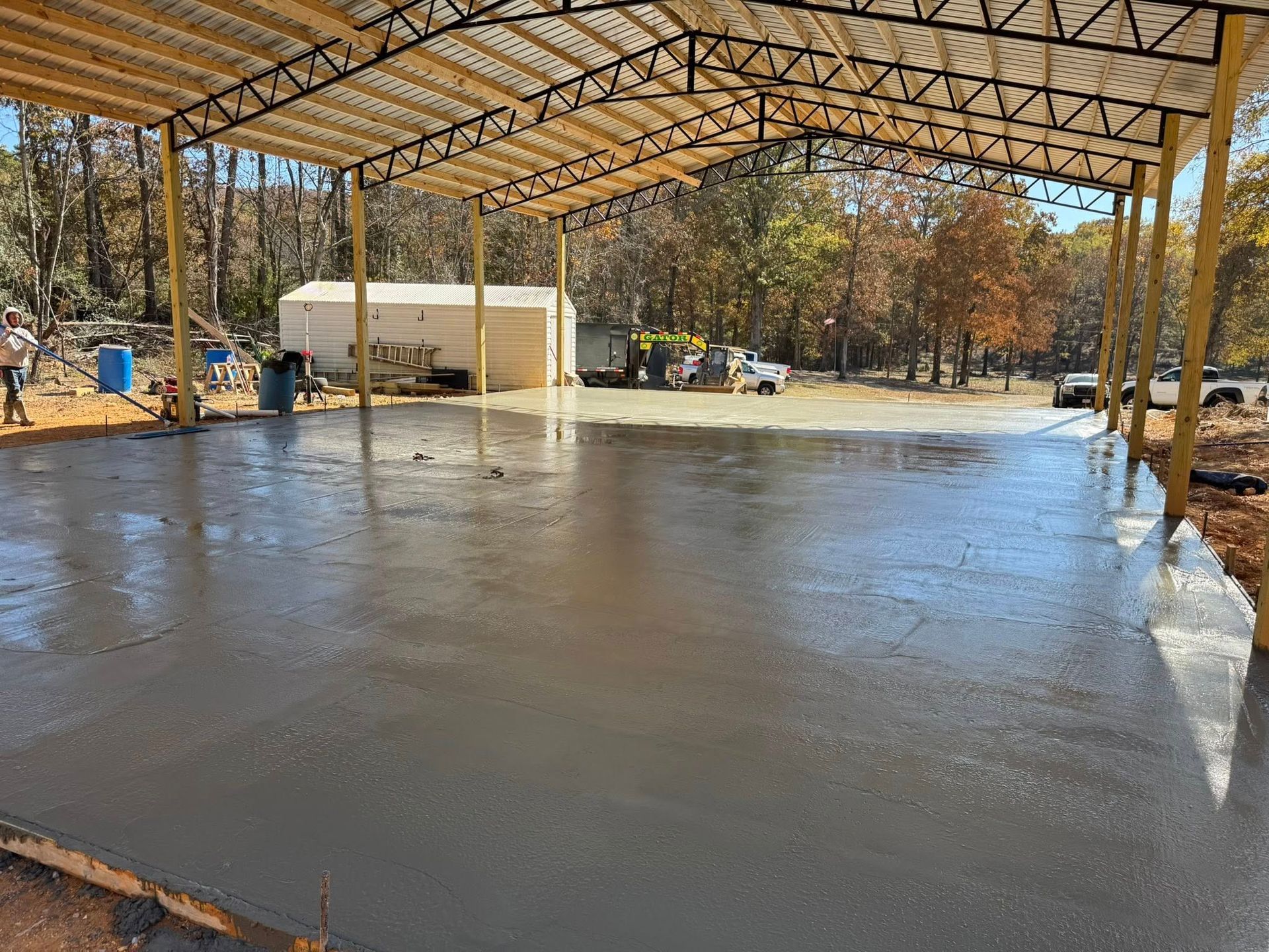 Family gathered at a dining table in a kitchen. They are eating and talking together.