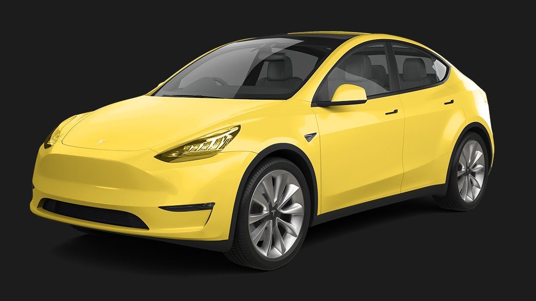 A yellow tesla model y is on a black background.