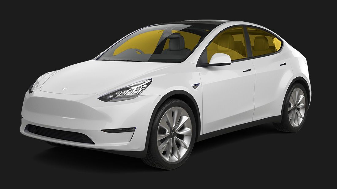 A white tesla model y with yellow windows on a black background.