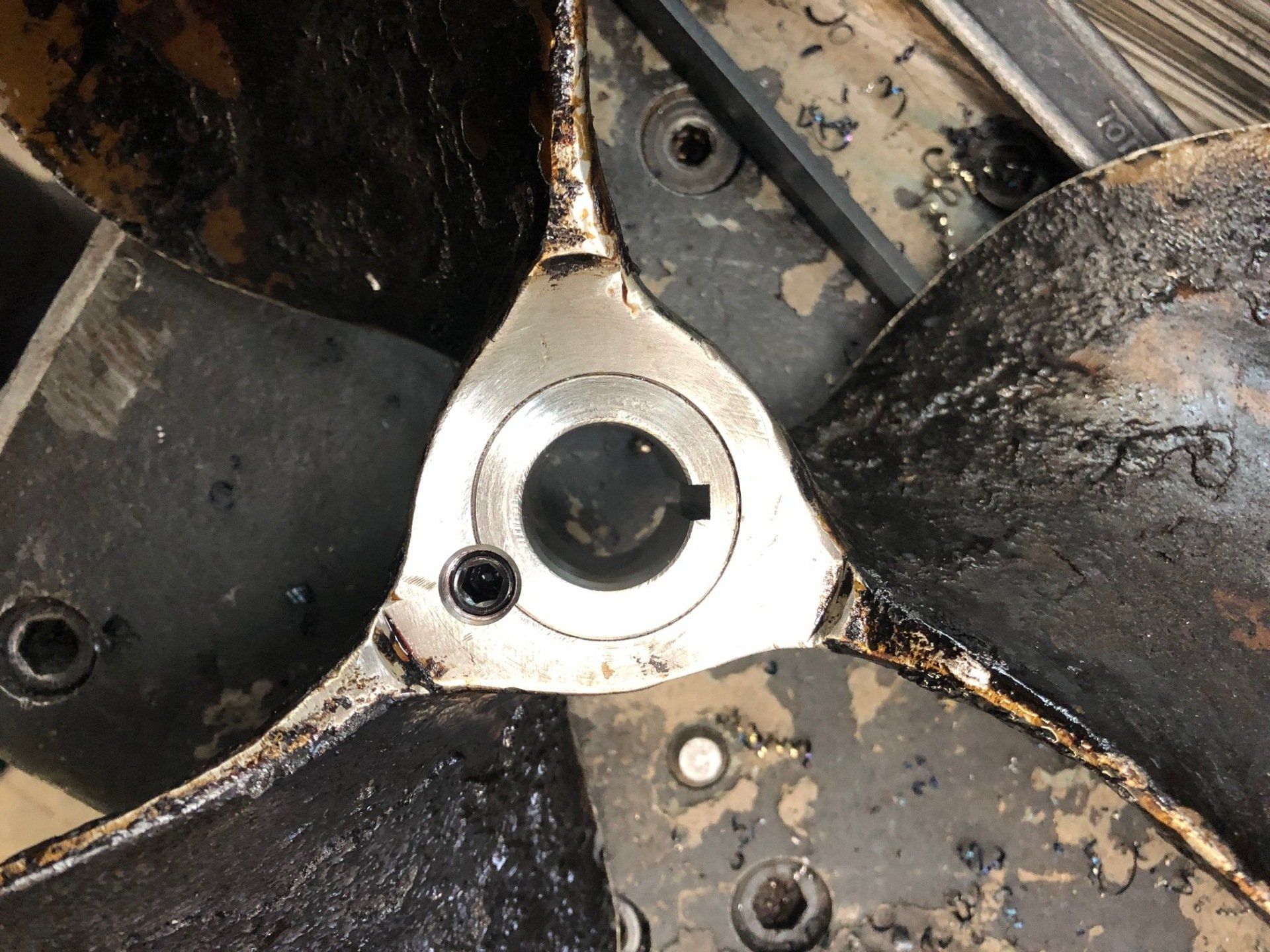 A close up of a metal object with a hole in the middle