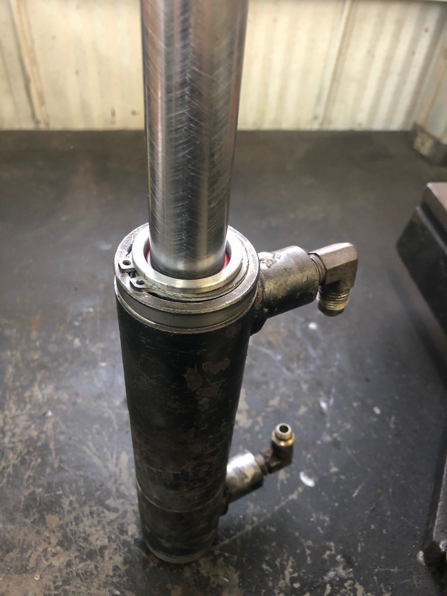 A close up of a metal pipe on a table.