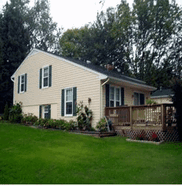 A Picture Of A House With Clean Backyard — Millersville, MD — Chesapeake Construction, Inc.