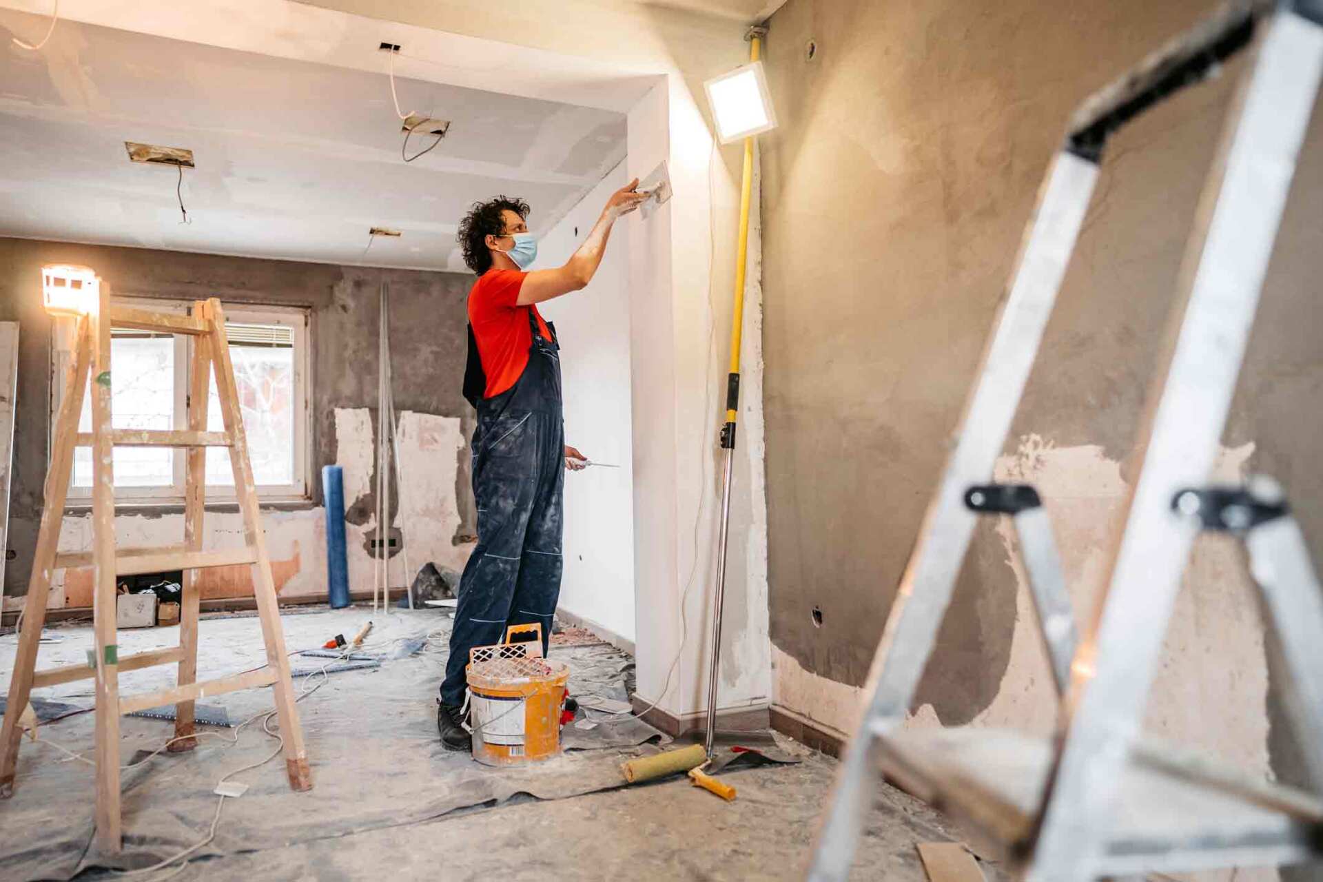 Carpenter Painting The Wall — Millersville, MD — Chesapeake Construction, Inc.
