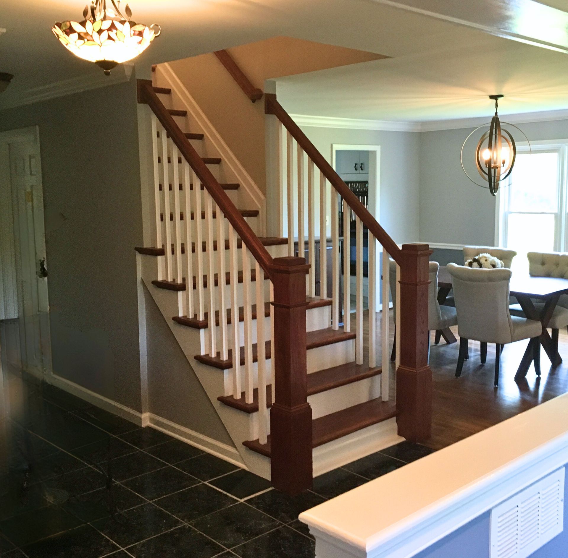 A staircase leading up to the second floor of a house