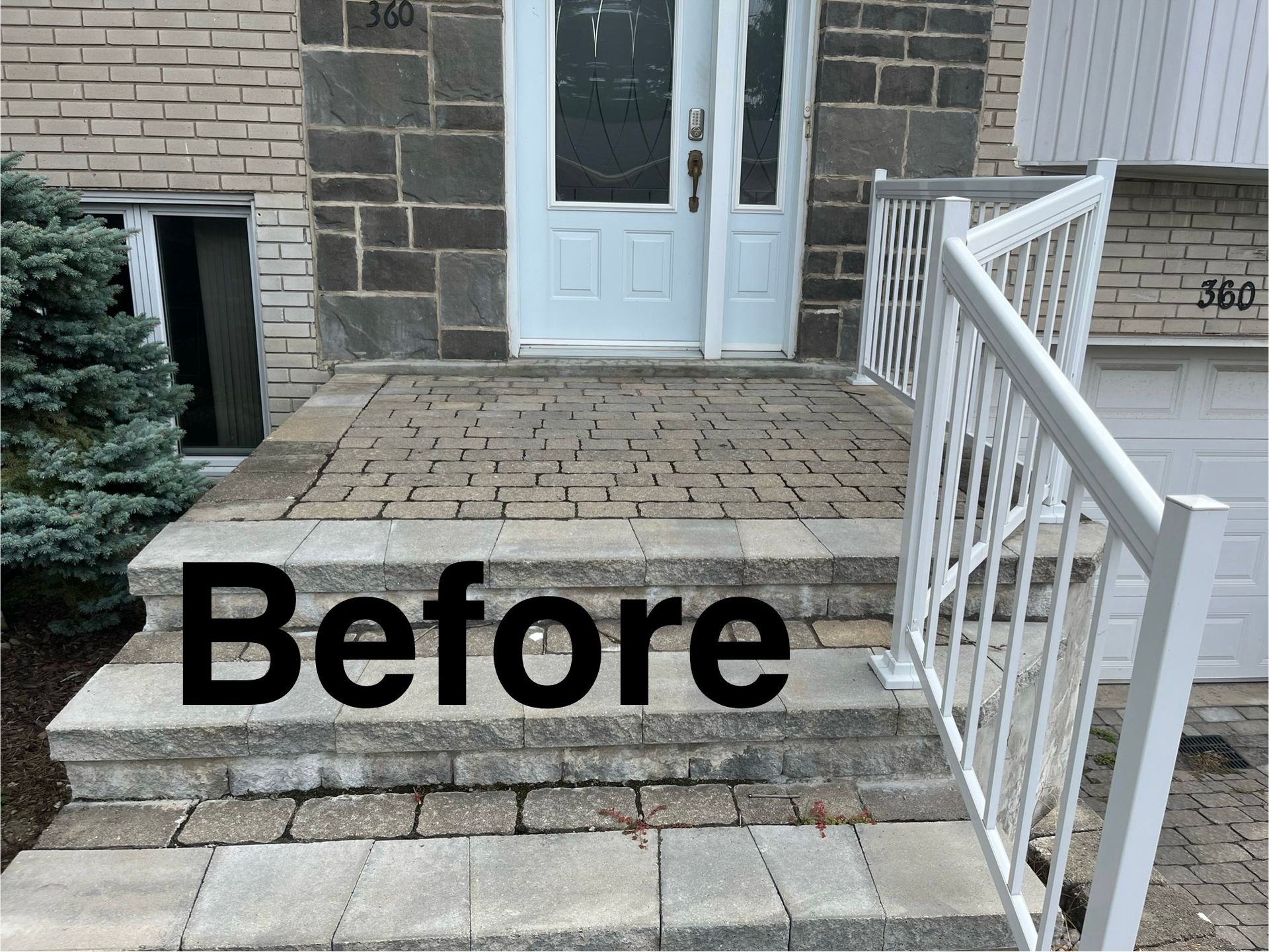 A before picture of a brick walkway with a white railing