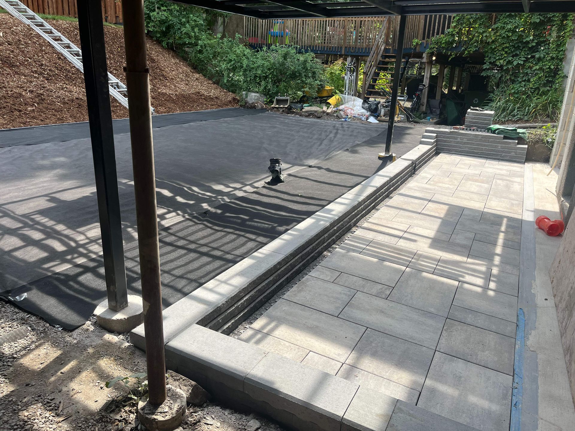 A patio with a fire hydrant in the middle of it