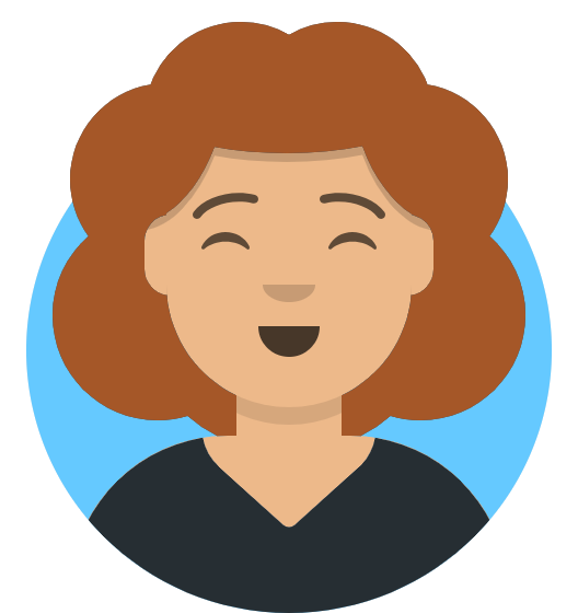 A woman with curly red hair is smiling with her eyes closed.