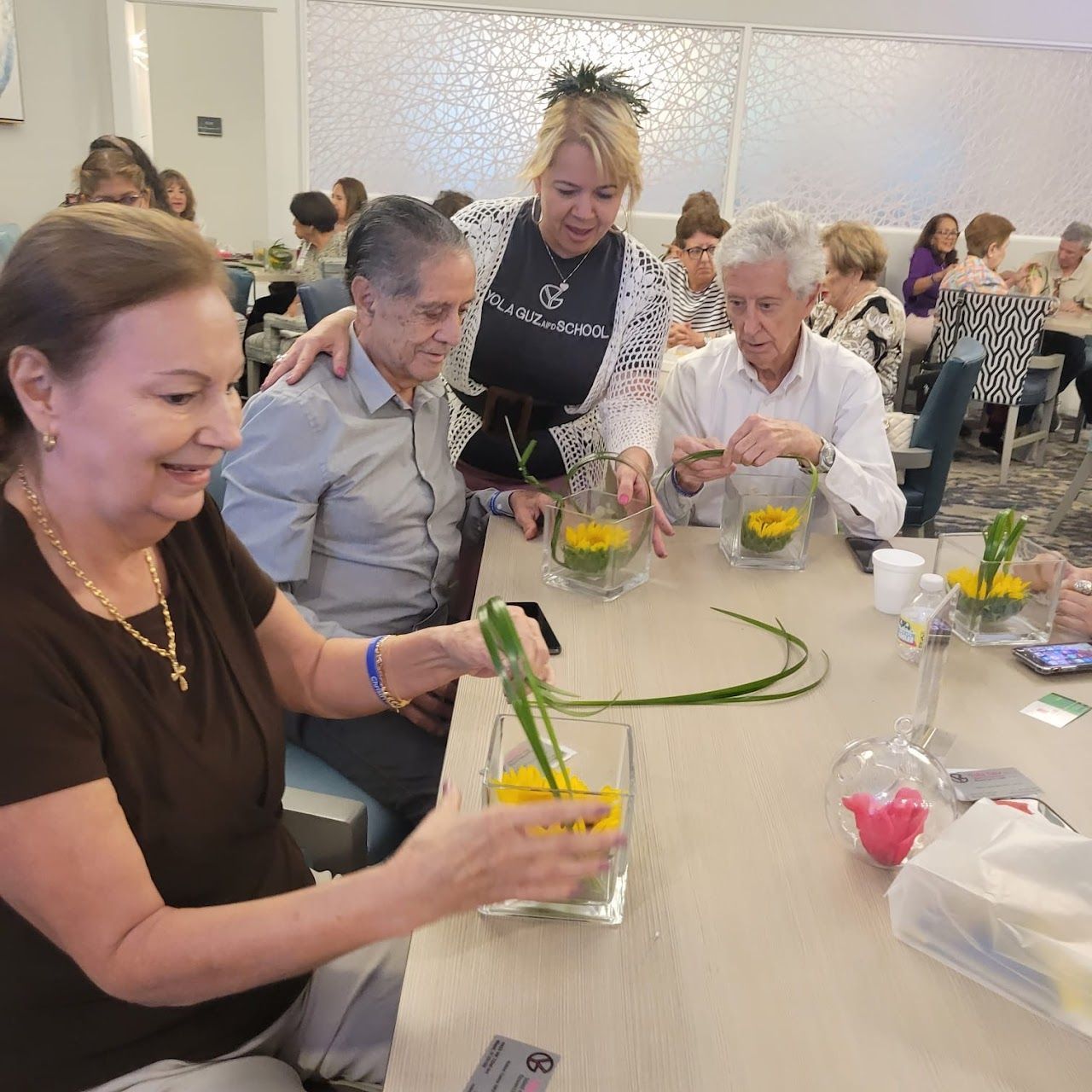Elders creating floral art