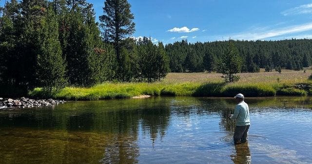 man-fishing-in-river