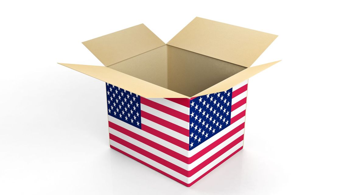 A cardboard box with an american flag on it