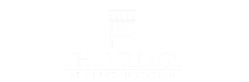 The Village at Odenton Station logo.