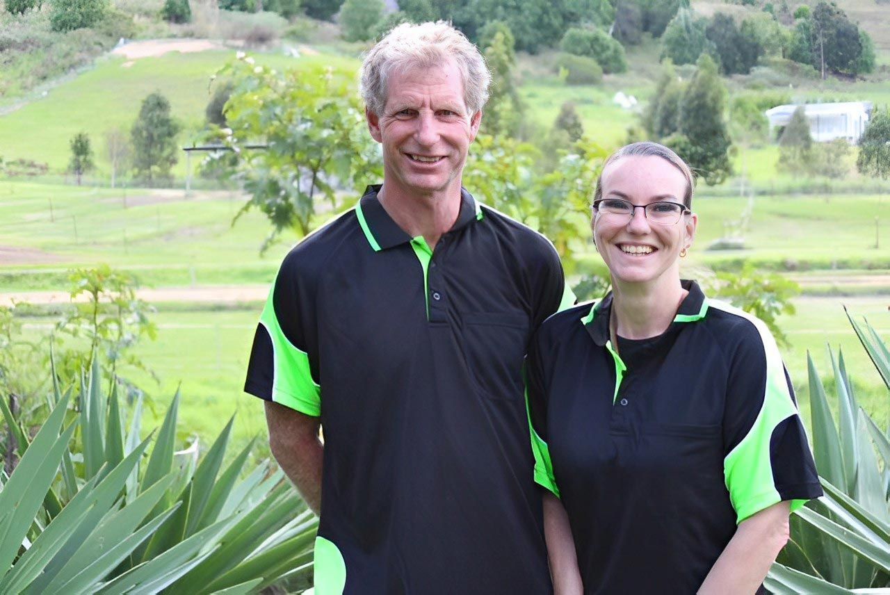 A Man and Woman Smiling — All Tree and Stump Works in Cobaki, NSW