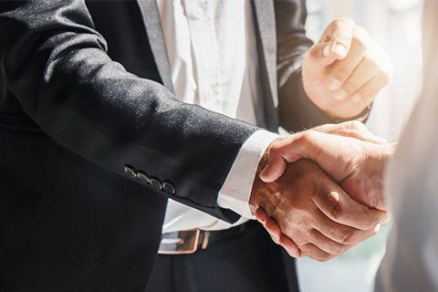 Attorney Shaking Hands with Client — Chiefland, FL — Smith Law Firm